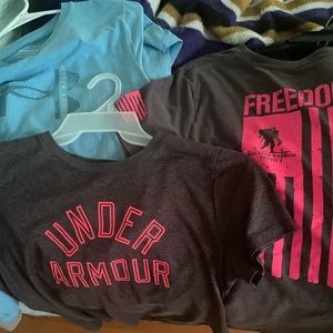 Women size med under armour shirts